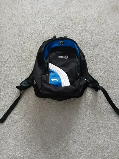 Made by Slazenger for BMO. Has several inside pockets and compartments. Good as new. Pick up in Port...