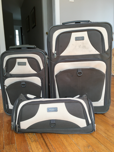 Large and Small rolling suitcases with telescopic handles + matching duffle bag. Please message if y...