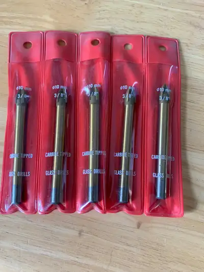 I have a bunch of new glass and tile bits for sale. 1- 3/8” carbide drill bit, 5 pack for $20. 40 bi...