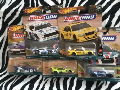 You are looking at a complete set of 5 cars Race Day 1/64 Look at all pictures this is the set you w...