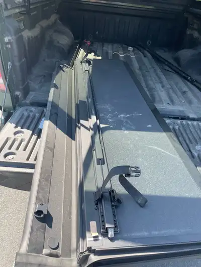 6ft Tonneau Cover off of Nissan Frontier. From the dealer in good condition only used for a year and...