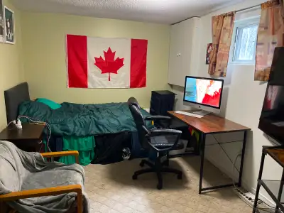 In clean, quiet, above-ground shared basement. Utilities and internet included, laundry $5/load. PAR...