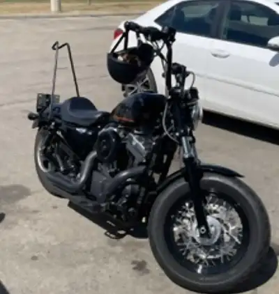 2014 Harley Davidson 48 Sportster in great shape with only 11,000 kms. Runs and sounds great with lo...