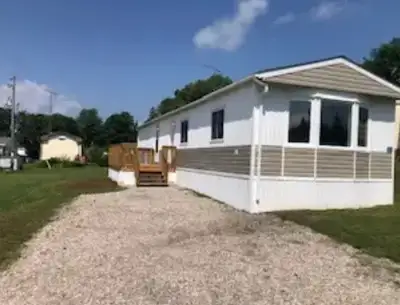 Welcome to this meticulously upgraded Canadian-made home by Shelter Industries, offering the perfect...