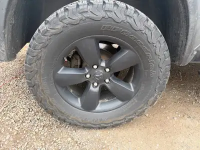 1/4 worn 35/12.5R20 K02 on CLASSIC RAM 1500 rims with TPM SENSORS asking 1850 OR BEST OFFER !!!! wil...