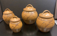 Set of 4 pottery canisters
