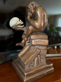 Vintage Austin Productions Darwin Monkey Holding Skull sculpture