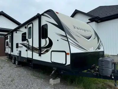 2017 Passport Ultralite 3220bh. Very clean and well kept inside and out. Has 2 pop-outs, 2 awnings a...