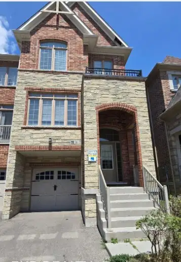 Spacious,luxurious,and highly desirable 4-bedroom end-unit freehold townhome perfectly situated in t...