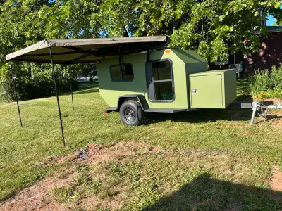 This homemade camper is a one-of-a-kind camping solution, featuring an interior with a cozy sleeping...