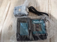 Brand new Makita rapid charger and 4Ah battery