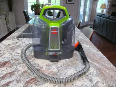 Bissell Little Green Pro pet portable carpet and upholstery cleaner. Like new in box,used once.