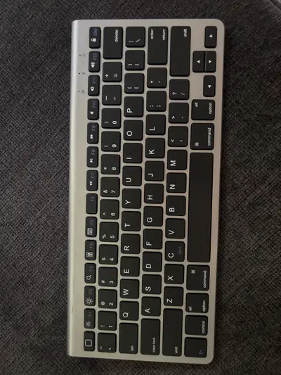 Has a little bit of wear OMOTON Wireless Keyboard Model: KB088 Battery Included
