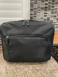 Rolling laptop bag with strap