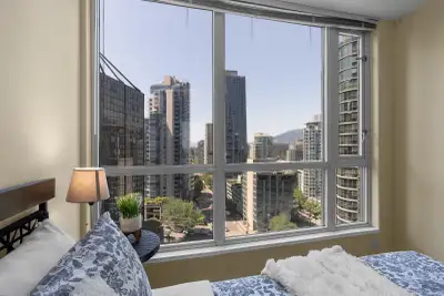 Clean, furnished private bedrooms available in a shared high-rise apartment in downtown Vancouver. D...