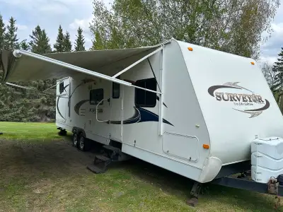 2011 Forest River Fibre Glass Cabin Trailer - Suryevor Eco-Lite Edition 31 feet with two slides; sle...