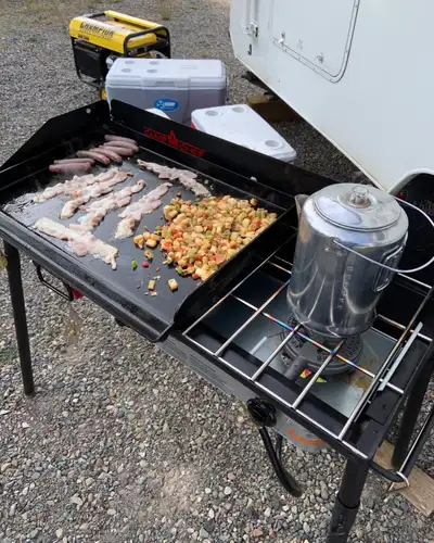Camp chef 3 burner stove with BBQ Box. Asking $409 obo.