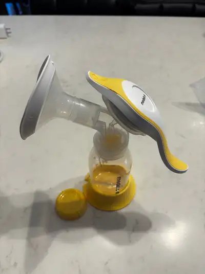 84 Medela milk storage bags and hand pump, View more