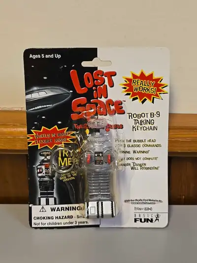 Explore the final frontier with the LOST IN SPACE ROBOT B-9 Talking Keychain, a treasured collectibl...