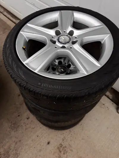 Selling a set of genuine Mercedes OEM alloy rims with Continental tires mounted and balanced. Specs:...
