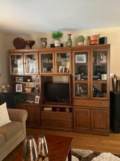 Three piece wall unit 96 wide by 78 tall with a 19 inch depth. Stereo equipment, surround sound syst...