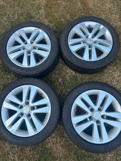 Selling 4 All Season tires On Saturn Rims 205/50/R16 Tires have lots of tread left 5x110 bolt patter...