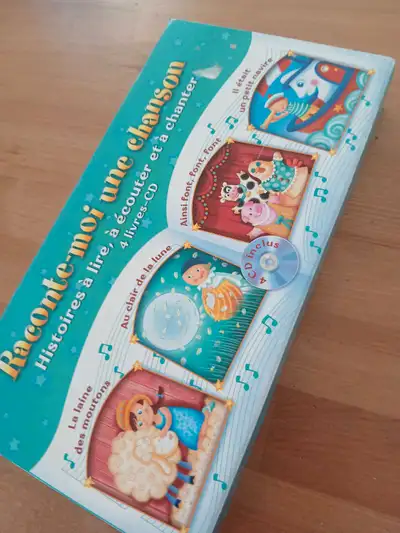 Boîte de 4 livres et 4 cds, View more