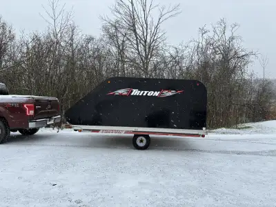 Snow is coming. Move your toys in style. This is a 11’ Triton Elite. The best built clamshell snowmo...