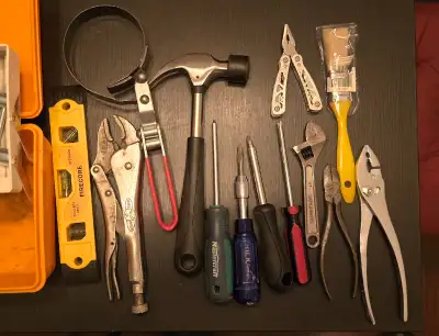 Small toolbox filled with tools., View more
