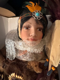 Porcelain indigenous doll