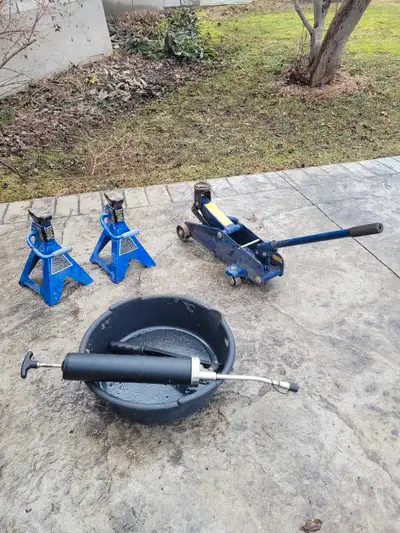 Lightly used set of small vehicle oil change materials. Jack is in good shape and stands are light u...