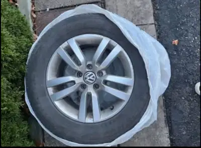 A full set of 215/65/16 Pirelli Scorpion tires with 60% tread on factory 16” Volkswagen OEM rims. Ti...