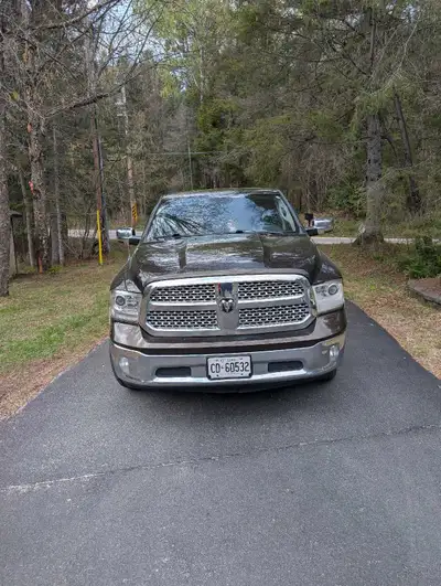 2013 Ram 1500 Laramie with 201,000 km on it 5.7L Hemi V8 Loaded truck Full leather interior Heated a...