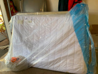 Double mattress, box spring, mattress topper & bedding.