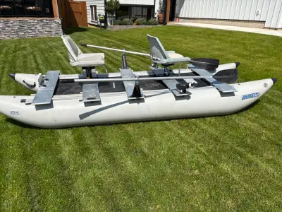 Folds up into 2 bags that will fit in the trunk of most cars.comes with seats oars, and foot pump. $...