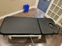 Used pro model massage table with motor and elevation