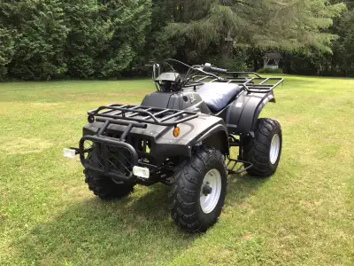 Manual transmission, four speed with reverse . Electric start ..