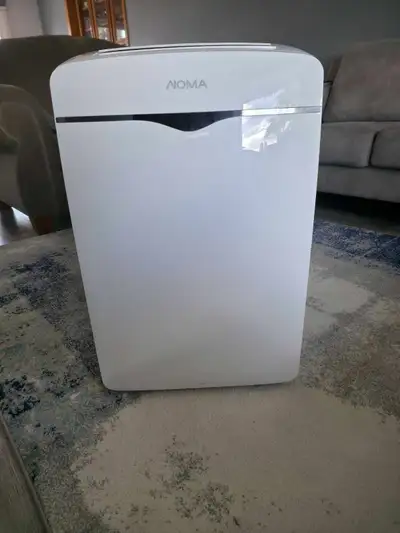 Features .NOMA 12,000 BTU 3-in-1 Portable Air Conditioner features a fan, dehumidifier and air condi...