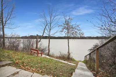 W A T E R F R O N T ! Don't miss your chance to live at this charming lakefront property on the tran...
