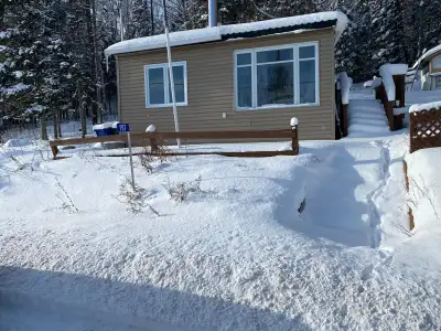 3 season cottage on a lake with almost one acer of land .No sewage and no water .Outhouse on propert...