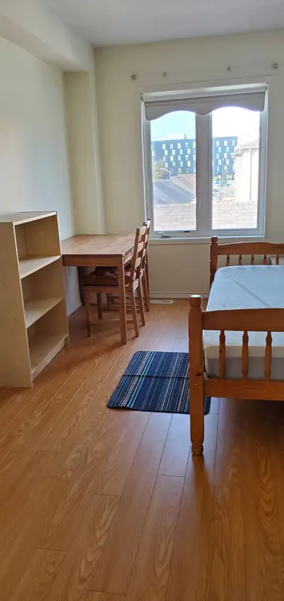 A big room for a female student in your village. The bathroom is shared with another female student....