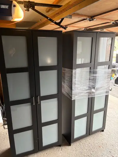 two black kitchen cabinets, excellent condition , View more