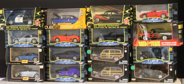34 NOS 1:24 Scale Die-Cast Cars
