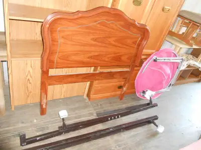 Pressed board twin head board and metal frame has marks, View more