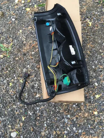 Cadillac taillights, new, still in box, not sure what year fits, bought by mistake. Also Dodge ram 2...