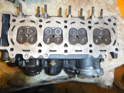 Cylinder head and complete bottom end in good condition.