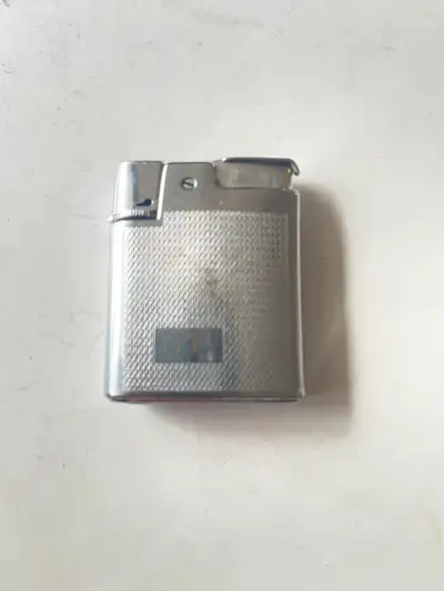 Ronson Cadet Butane Lighter - a collectible lighter in good pre-owned condition - untested (needs fu...