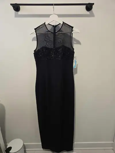 Brand new ladies size 4 elegant dress tags on, View more