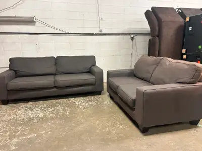 Dark Grey Sofa Set in fair condition, comes from a cat home and has light staining from sun fading....