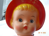 Vintage girl, 13 inch , molded red bonnet,jointed,shoes,dress/63